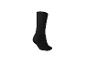 Chaussette noire unique sur fond blanc