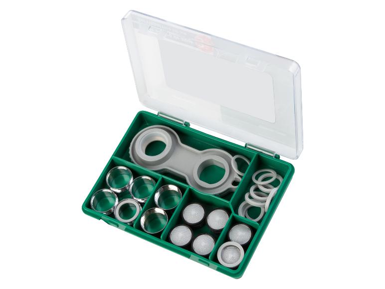 Kit de réparation pour robinets avec joints et filtres dans une boîte verte.
