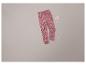 Pantalon de jogging rose avec un imprimé en forme de cœur.