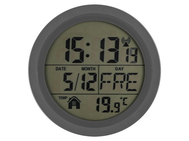 Horloge numérique affichant l'heure, la date, le jour et la température intérieure de 19,9°C.