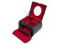 Un coffret à bijoux en cuir noir avec un intérieur rouge et un miroir.