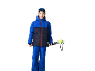 Enfant en tenue de ski bleue avec veste matelassée, pantalon et bâtons de ski.