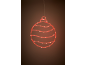 Silhouette de boule de Noël LED rouge avec des rayures ondulées, suspendue sur un fond sombre.