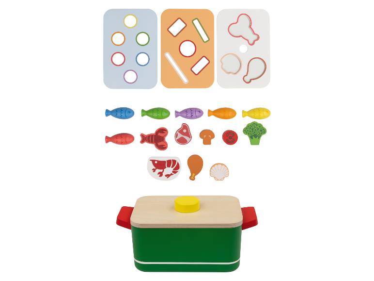 Ensemble de jouets avec casserole, aliments et planches de formes