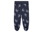 Pantalon bébé bleu à motifs bateaux.
