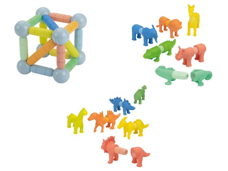Ensemble de construction magnétique coloré et figurines d'animaux à assembler.