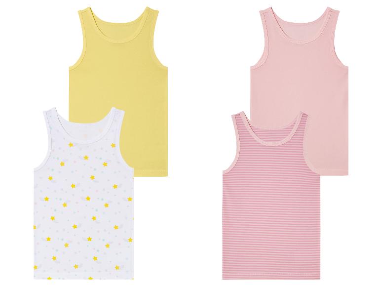 Quatre débardeurs pour filles : deux unis, un à rayures et un à étoiles.