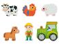 Jouets de ferme : vache, coq, mouton, cheval, tracteur et fermier.