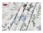Tissu blanc avec un imprimé floral de fleurs et de feuilles pastel