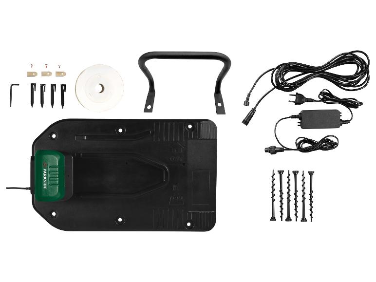 Kit d'installation de robot tondeuse Parkside avec station de charge, câbles et accessoires.
