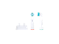 Deux têtes de brosse à dents électrique Oral-B et une base de chargement.