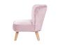 Fauteuil en velours rose avec pieds en bois