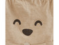 Pantalon beige avec un visage souriant imprimé.