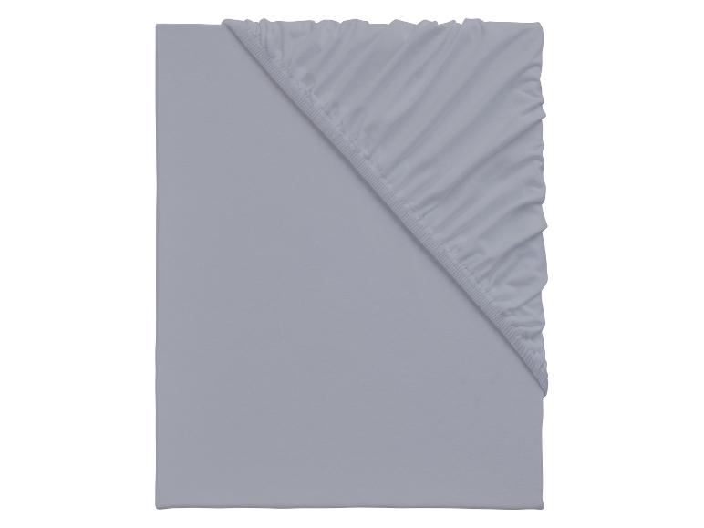 Drap-housse gris clair, plié