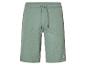 Shorts en tissu gaufré vert clair, style décontracté.