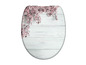 Un abattant de toilettes avec un imprimé floral sur un fond en bois.