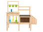 Une cuisine en bois pour enfant avec un évier, une cuisinière et un espace de rangement