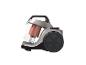 Aspirateur traîneau gris et noir avec réservoir transparent.