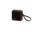 Enceinte Bluetooth portable noire avec grille texturée et accents dorés.