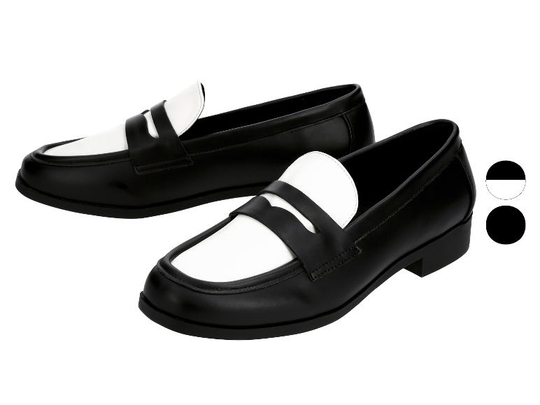 Mocassins femme bicolores noir et blanc.