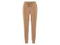 Pantalon de survêtement beige avec le logo U.S. Grand Prix.