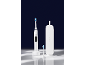 Brosse à dents sonique rechargeable Dentalux avec socle de charge, tête de rechange et étui.