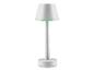 Une lampe de table blanche avec un abat-jour rond.