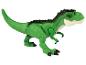 Un dinosaure jouet T-Rex vert.