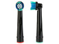 Deux têtes de brosse à dents électrique avec des poils bleus et verts.