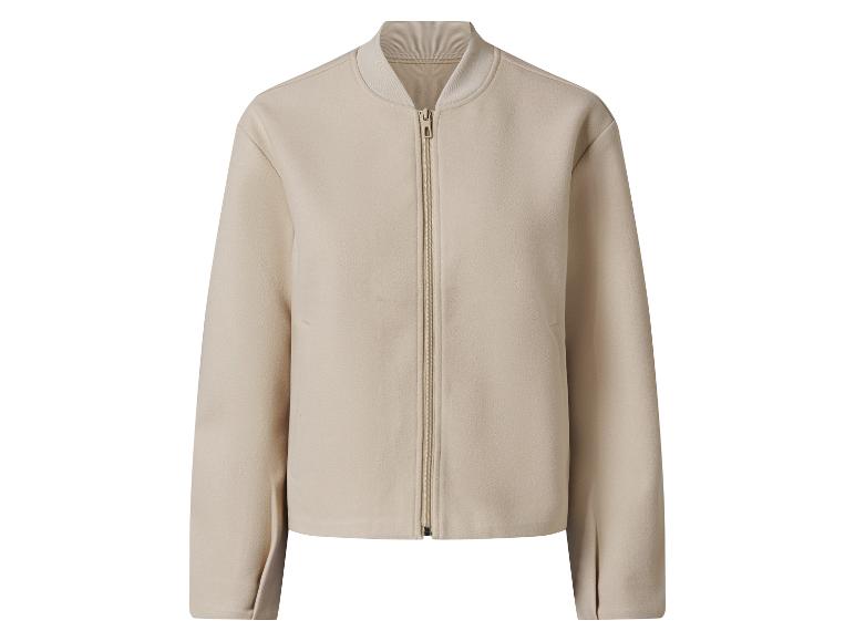 Blouson bomber beige à fermeture éclair.