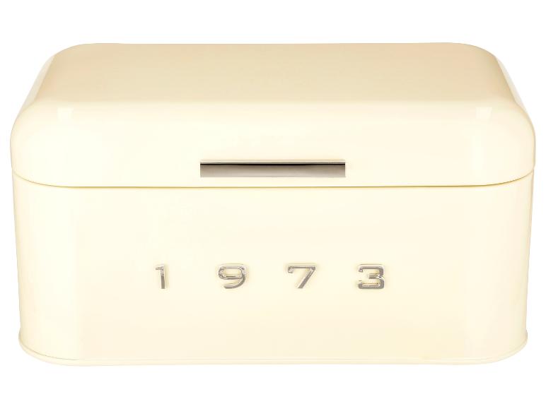 Une boîte à pain en métal crème avec le numéro '1973'.