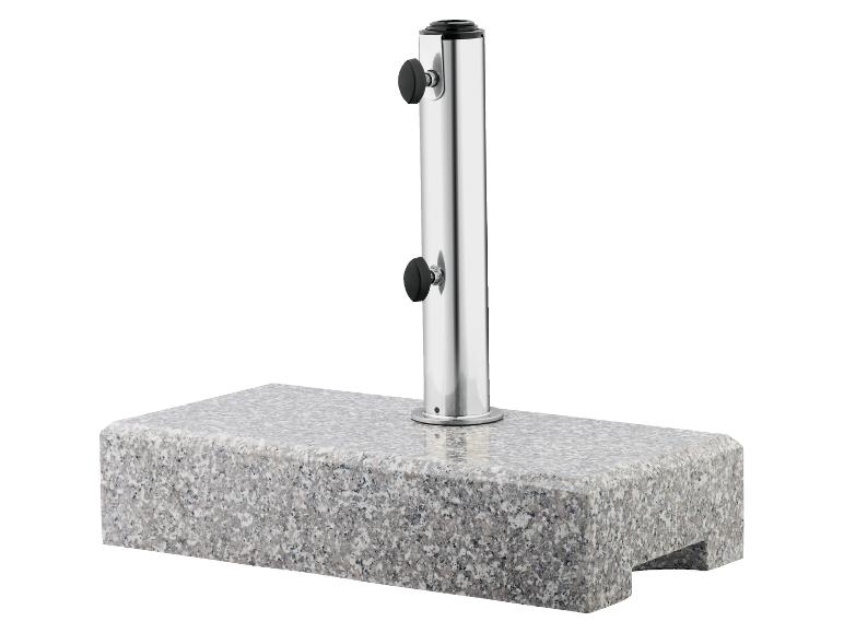 Pied de parasol rectangulaire en granit avec un mât en acier inoxydable.