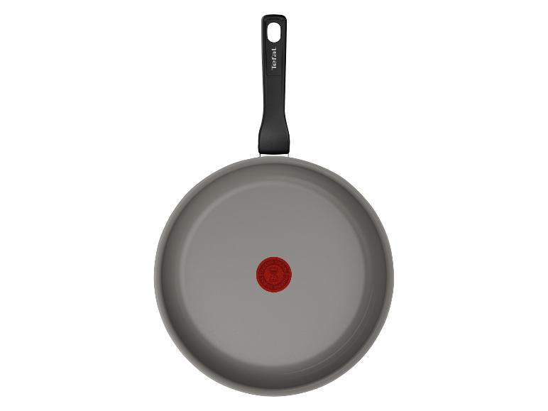 Poêle à frire Tefal grise avec poignée noire et indicateur de chaleur rouge