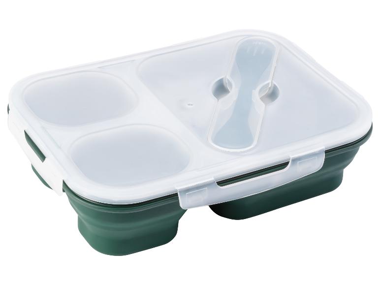 Boîte à lunch pliable verte avec trois compartiments et une fourchette intégrée.