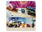 Vue détaillée : LEGO City Gefangenentransporter avec figurines et moto.