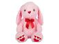 Lapin en peluche rose avec un nœud rouge.