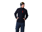 Homme en veste polaire bleu foncé, pantalon de ski et bonnet avec lunettes