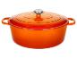 Cocotte en fonte émaillée orange avec couvercle et bouton argenté.
