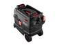 Un aspirateur noir avec des détails rouges et des roues.