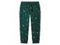 Pantalon de jogging vert avec motif de Noël de voitures transportant des sapins.