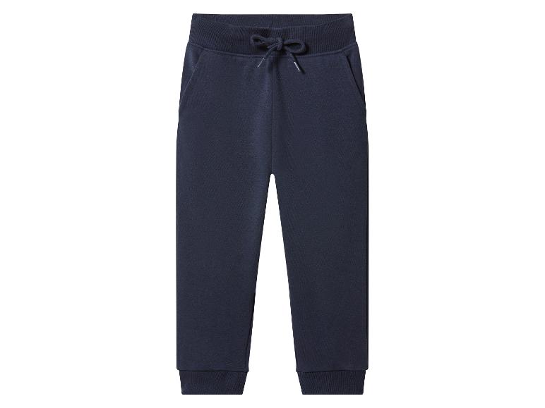 Pantalon de jogging bleu foncé pour enfant avec cordon de serrage à la taille et poignets côtelés.