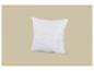 Oreiller blanc avec motif ondulé sur fond beige