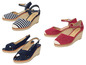 Trois paires d'espadrilles à talons hauts, dont une paire à rayures, une paire à ancre et une paire à motifs ajourés.