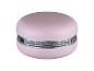 Haut-parleur rose en forme de macaron avec grille argentée