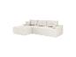 Canapé d'angle modulaire crème avec coussins, revêtu de tissu côtelé.