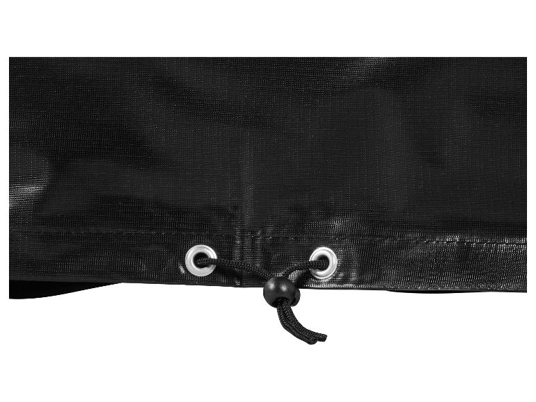 Détail d'une bâche de protection noire avec cordon de serrage et œillets.