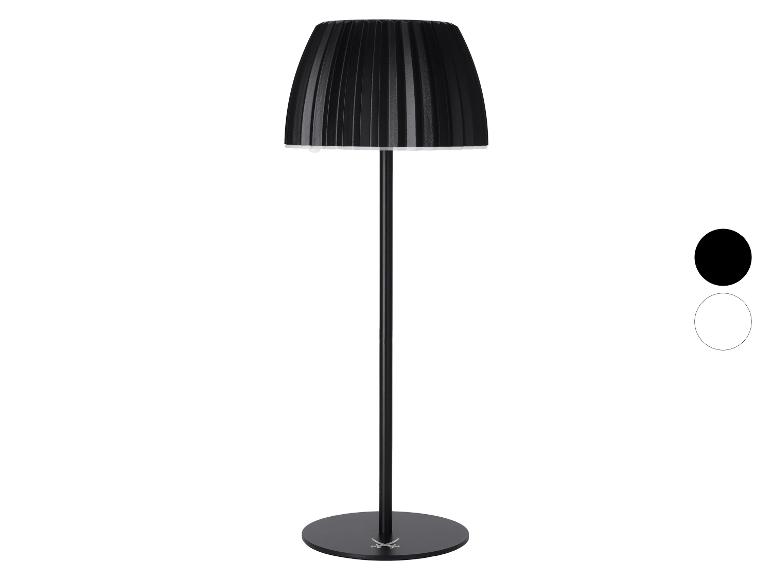 Lampe de table noire avec abat-jour plissé et base ronde, avec options de couleur noir et blanc.
