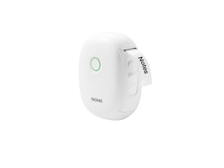 Imprimante d'étiquettes portable blanche avec bouton vert, émettant une étiquette avec le texte « Notes »