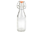 Bouteille en verre transparent avec bouchon mécanique et joint en caoutchouc orange.
