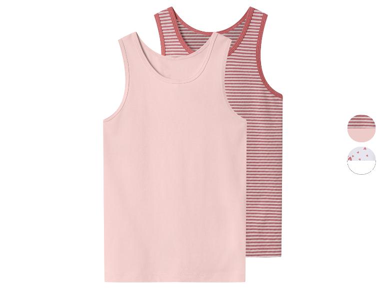 Deux débardeurs pour filles, un rose uni et un rayé rose et blanc, avec une option de motif cœur.